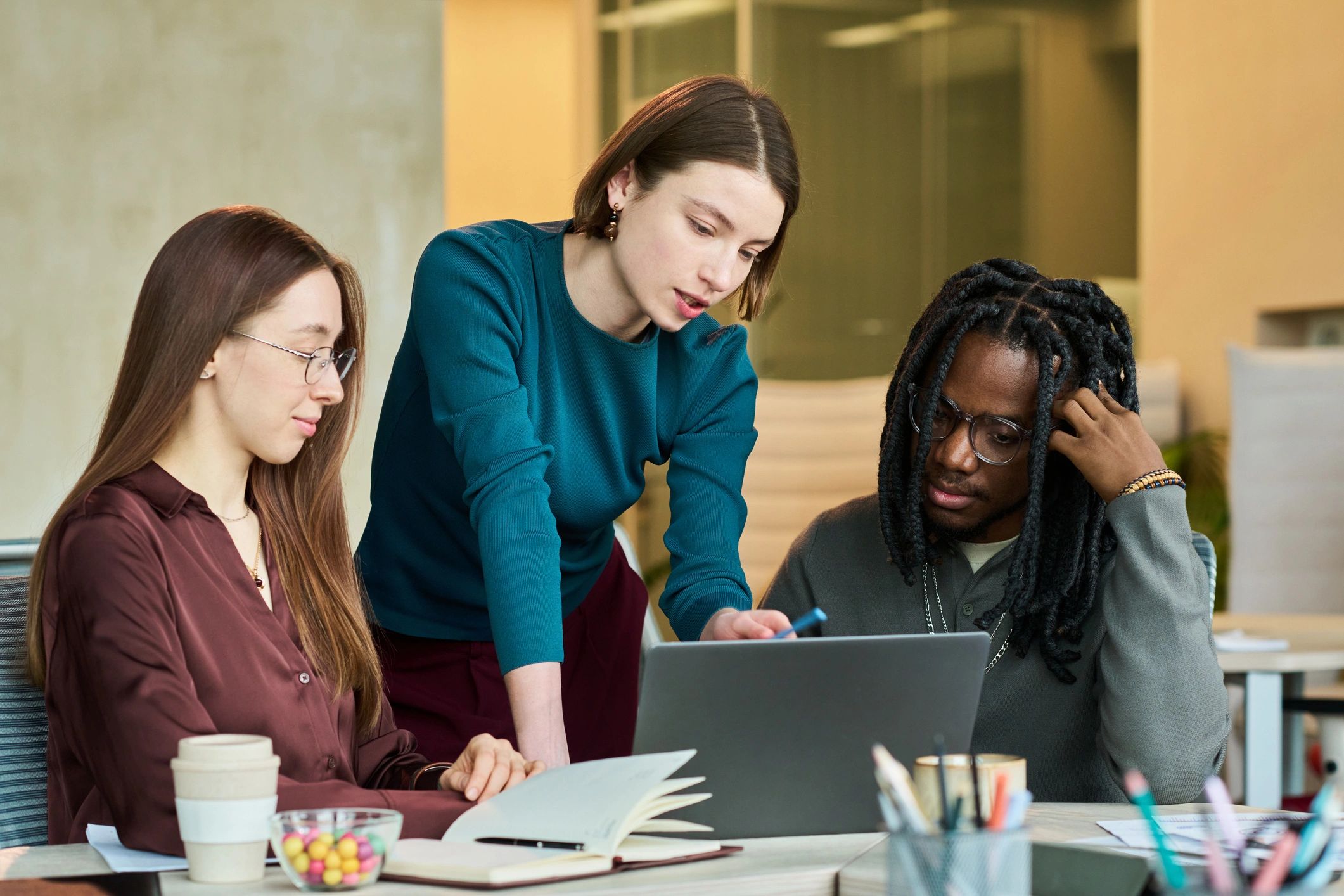 Professional team discussing compliance planning in an office